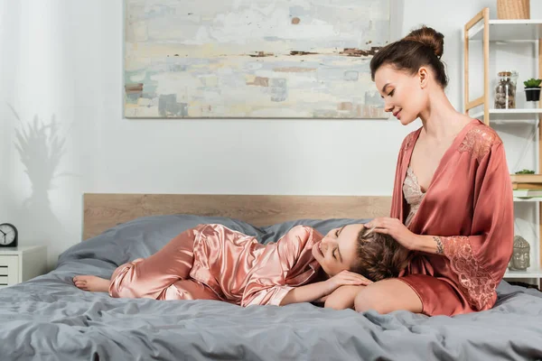 Smiling Pansexual Person Touching Hair Lover Relaxing Bed Satin Pajamas — Stock Photo, Image