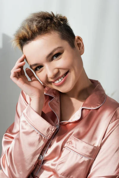 Joyful Pangender Person Satin Pajamas Holding Hand Face While Looking — Stock Photo, Image