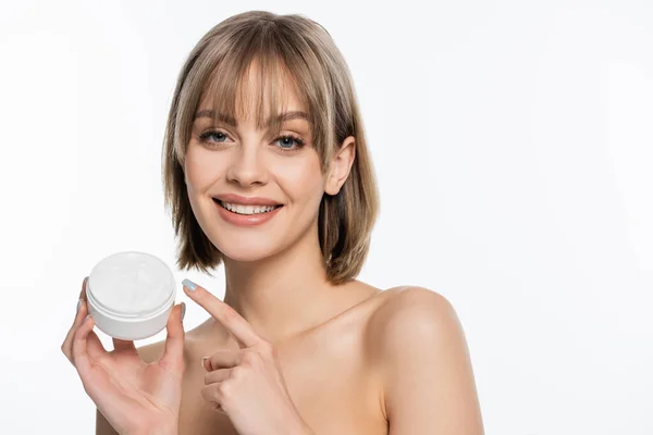 Happy Young Woman Bangs Pointing Finger Container Face Cream Isolated — Φωτογραφία Αρχείου