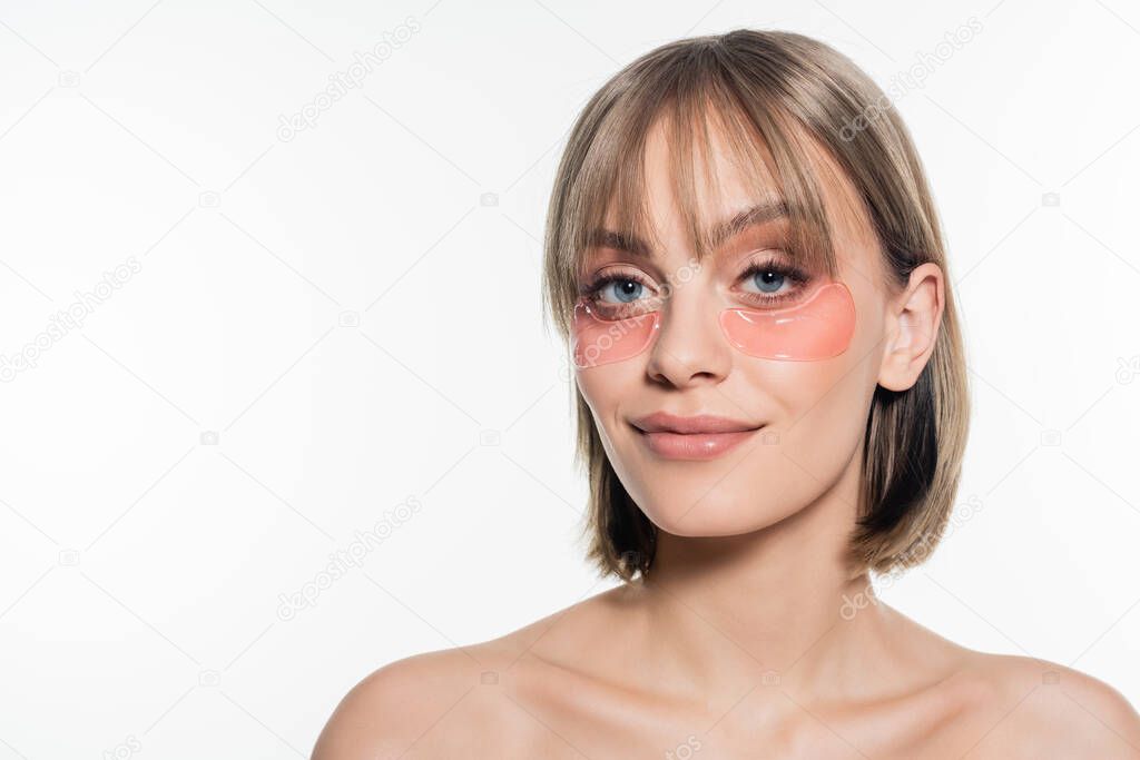 happy young woman with hydrogel eye patches isolated on white