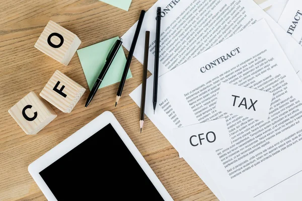 Top View Papers Tax Cfo Lettering Contract Wooden Cubes Digital — Stock Photo, Image