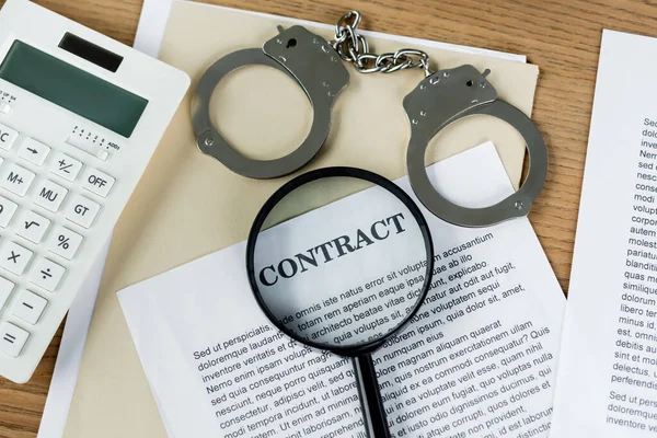 Top View Magnifier Papers Contract Lettering Calculator Handcuffs — Stock Photo, Image