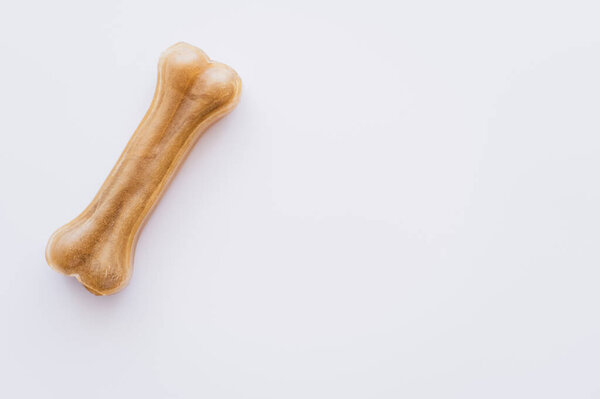 вид сверху на кость формы питомца лечения изолированы на белом