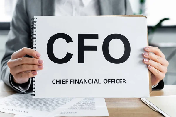 Cropped View Businesswoman Holding Notebook Cfo Lettering Office — Stock Photo, Image