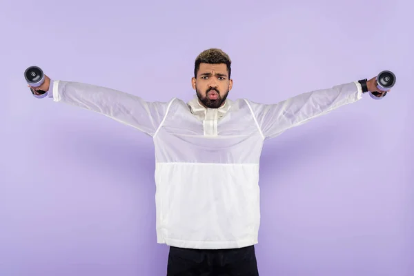 Bearded African American Sportsman Outstretched Hands Exercising Dumbbells Purple — Stock Photo, Image