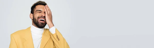 Happy African American Man Pastel Yellow Blazer Closing Eye Laughing — Stock Photo, Image