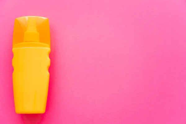 Top View Orange Bottle Sunscreen Pink Surface — Stock Photo, Image