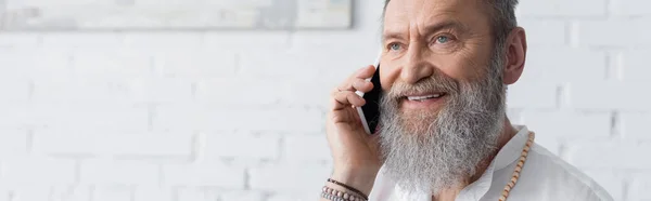 Smiling Bearded Spiritual Mentor Talking Cellphone Home Banner — Stock Photo, Image