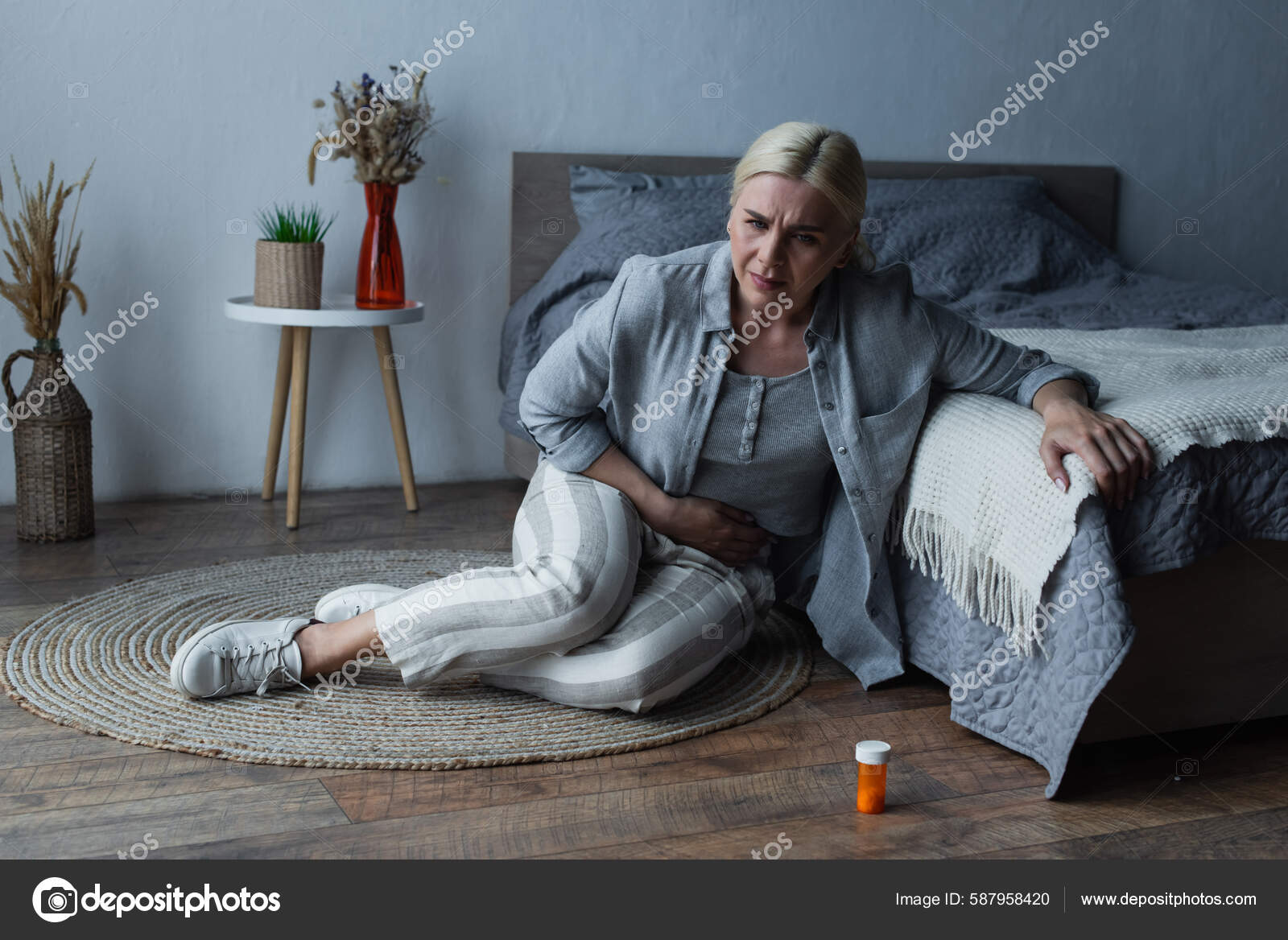 Woman Menopause Sitting Bed While Suffering Abdominal Pain — Stock Photo © IgorVetushko 587958420