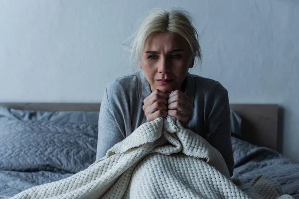 Depressed Blonde Woman Menopause Holding Blanket While Bed — 스톡 사진