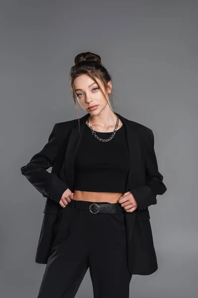 Pretty Woman Black Suit Crop Top Posing Hands Waist Isolated — Zdjęcie stockowe