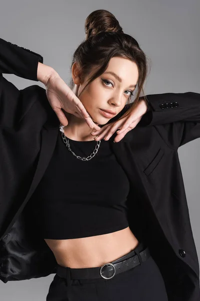 Pretty Woman Black Clothes Silver Necklace Posing Hands Face Isolated — ストック写真