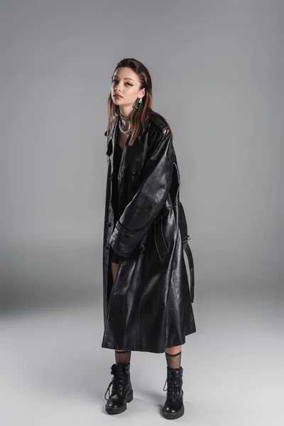 Full Length Trendy Woman Black Leather Coat Grey Background — Stockfoto