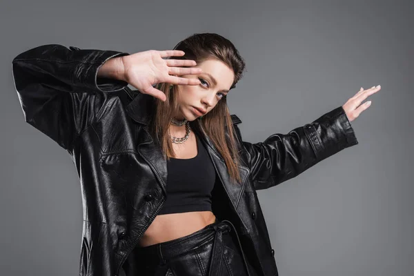 Young Stylish Woman Black Leather Coat Gesturing Looking Camera Isolated — ストック写真