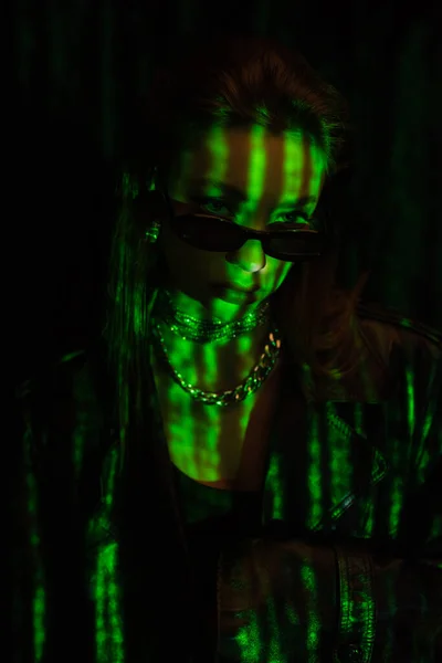 Young Woman Dark Sunglasses Metal Accessories Green Neon Light Isolated — Foto de Stock