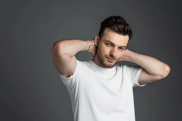 Bearded Brunette Man Touching Neck Looking Camera Isolated Grey — Fotografia de Stock