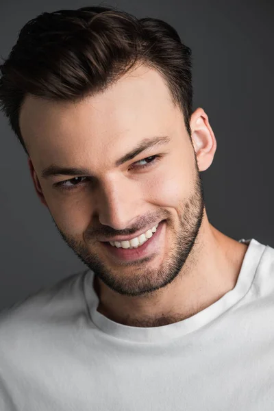 Portrait Cheerful Young Man Looking Away Isolated Grey — Stok fotoğraf