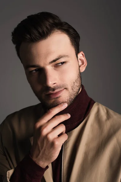 Brunette Man Jacket Touching Chin Looking Away Isolated Grey — Stock Photo, Image