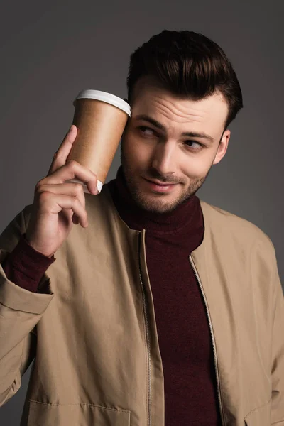 Trendy Man Autumn Jacket Holding Coffee Face Isolated Grey — Stockfoto
