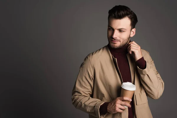 Fashionable Young Man Autumn Jacket Holding Takeaway Coffee Isolated Grey — Fotografia de Stock