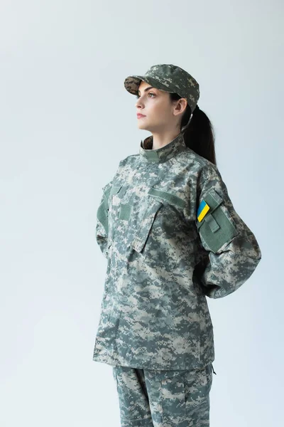 Young Soldier Uniform Ukrainian Flag Looking Away Isolated Grey — Stockfoto