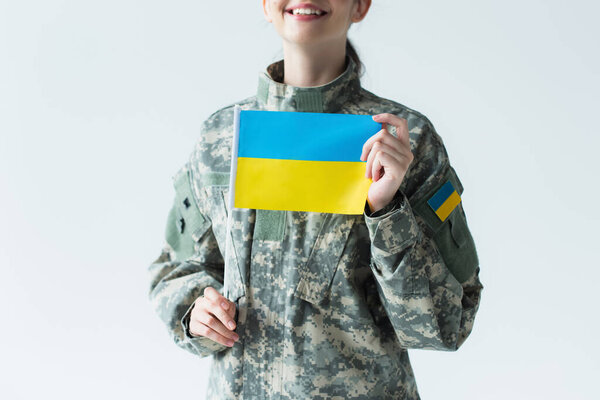 Cropped View Happy Soldier Holding Ukrainian Flag Isolated Grey — стоковое фото