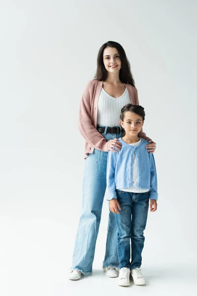 Full Length Positive Woman Daughter Jeans Standing Grey Background — Stockfoto