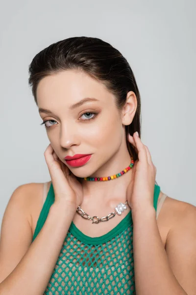 Stylish Model Green Tank Top Colorful Necklace Looking Camera Isolated — 스톡 사진
