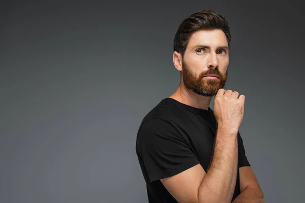 Portrait Pensive Man Black Shirt Looking Away Isolated Grey — Stock Photo, Image