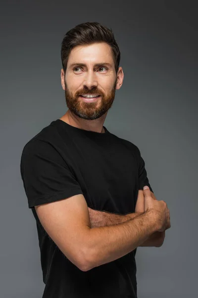 Portrait Happy Man Shirt Looking Away While Standing Crossed Arms — Stockfoto