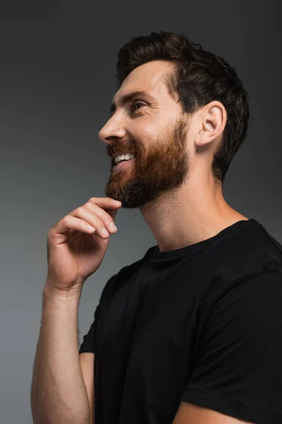 Portrait Happy Man Beard Black Shirt Smiling Isolated Grey — Stock Photo, Image