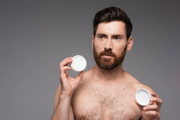 Bearded Shirtless Man Holding Container Face Cream Isolated Grey — Fotografia de Stock