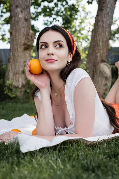 Stylish Young Woman Holding Orange Blanket Blurred Grass Park — Stock Photo, Image