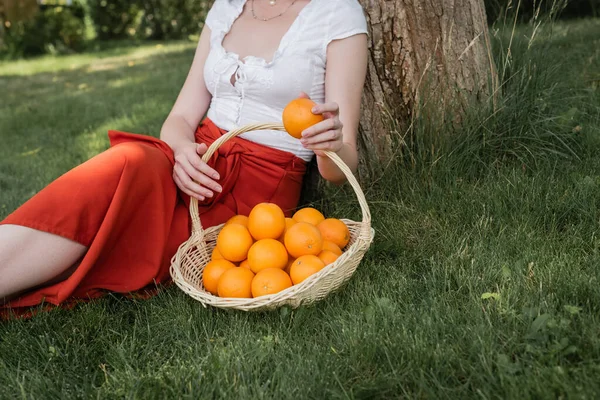 Cropped View Stylish Woman Holding Orange Basket Park — 스톡 사진