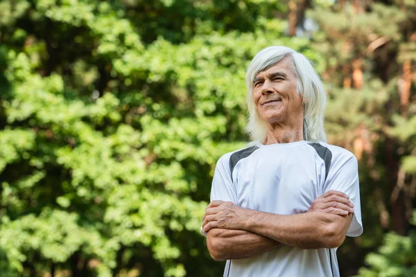 Happy Senior Man Sportswear Standing Crossed Arms Green Park — Stok fotoğraf