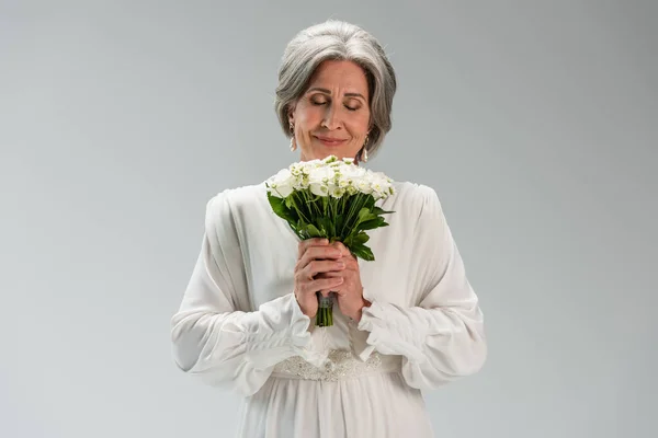 Joyful Middle Aged Bride White Wedding Dress Holding Bouquet Smelling — Foto de Stock