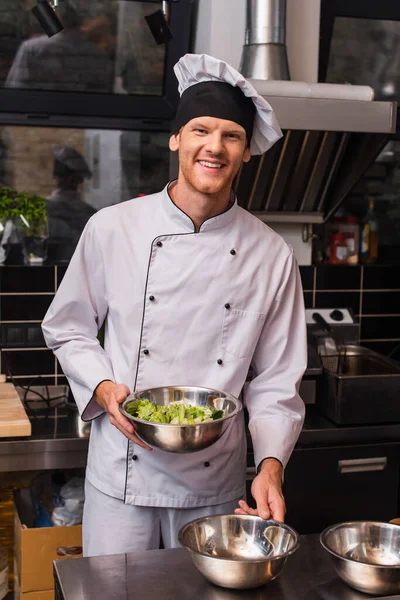 Cheerful Chef Hat Uniform Holding Bowl Lettuce Kitchen — 图库照片