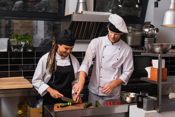 Smiling African American Sous Chef Cutting Cucumber Head Cook Kitchen — ストック写真