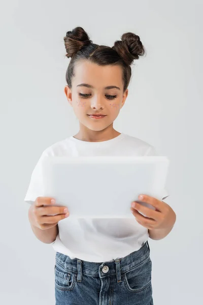 Cute Girl Glitter Stars Cheeks Using Digital Tablet Isolated Grey — Foto Stock