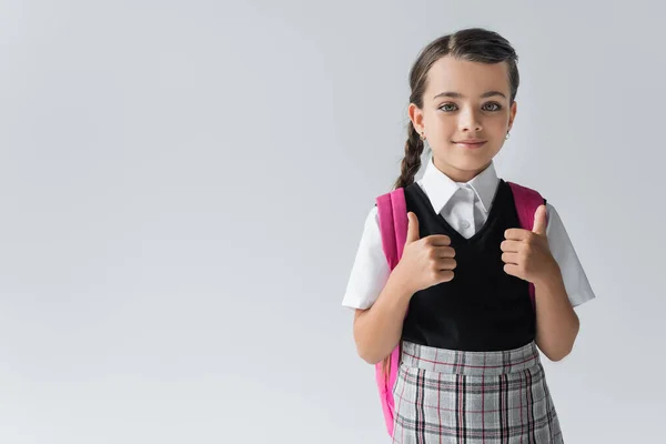 Cheerful Schoolgirl Backpack Standing School Uniform Showing Thumbs Isolated Grey — Photo