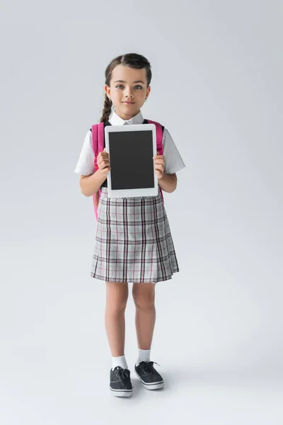 Full Length Cute Schoolgirl Uniform Holding Digital Tablet Blank Screen — 图库照片