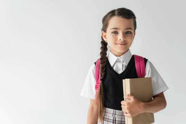 Adorable Schoolgirl Uniform Holding Books Smiling Isolated Grey — Φωτογραφία Αρχείου