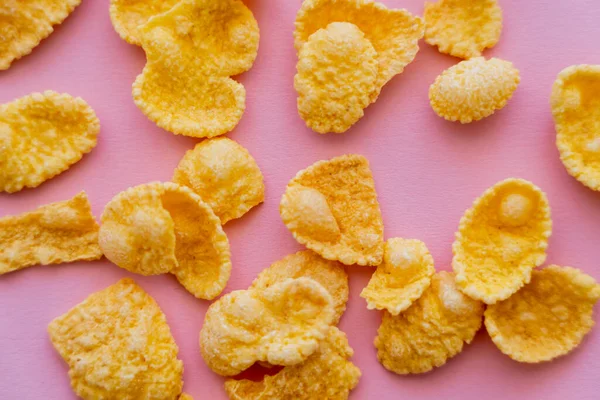Top View Tasty Yellow Corn Flakes Pink Background — Stock Photo, Image