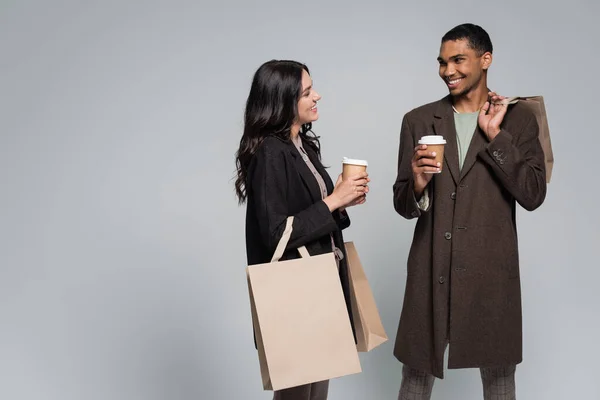Cheerful Interracial Couple Stylish Outfits Holding Shopping Bags Paper Cups — Stock Photo, Image