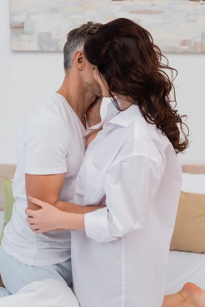Woman Shirt Kissing Husband Bed Home — Stock Photo, Image