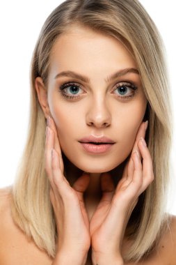 portrait of blonde woman with natural makeup and bare shoulders looking at camera isolated on white clipart