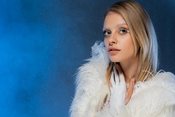 Curious Pierced Woman Faux Fur Jacket White Feathers Posing Dark — Stock Photo, Image