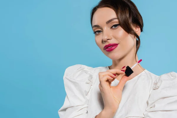 Happy Young Woman Blouse Holding Pink Lip Gloss Isolated Blue — Stock Photo, Image