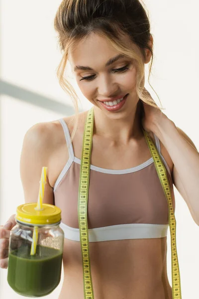 Happy Woman Measuring Tape Jar Fresh Smoothie Smiling White Background — Stock Photo, Image