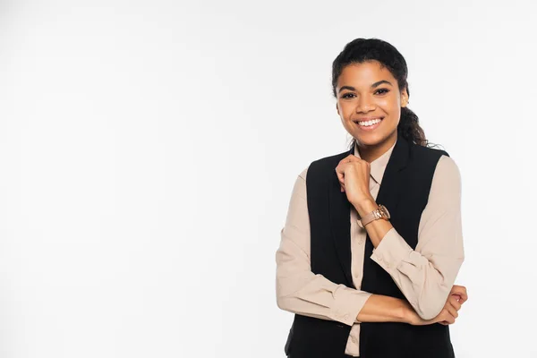 Smiling african american businesswoman looking at camera isolated on white — Stock Photo